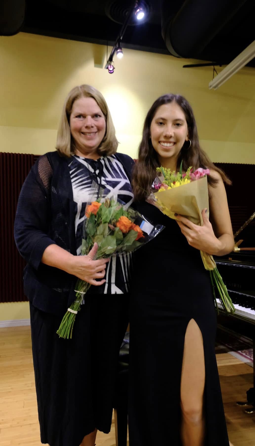Dr. Martha Albrecht standing with a student after a 2023 senior recital